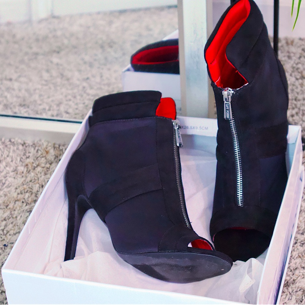All black ankle boots with zipper
